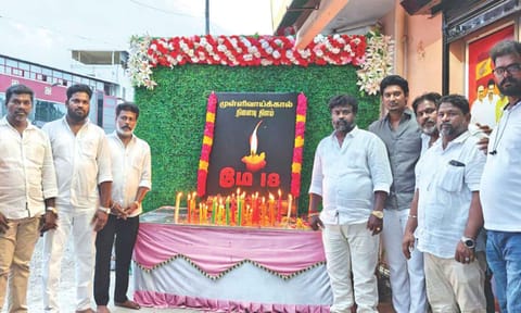 TVK party functionaries participate in the candlelight vigil held in the city, on Sunday