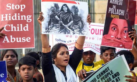 Members of various Tamil organisations hold placards and raise slogans during a protest against the Pollachi sexual assault case in Chennai, on 15 March 2019. (PTI)