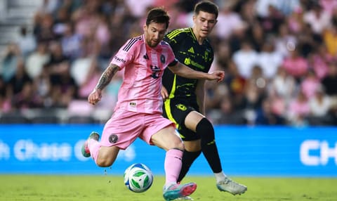 Lionel Messi takes a shot during the match&nbsp;