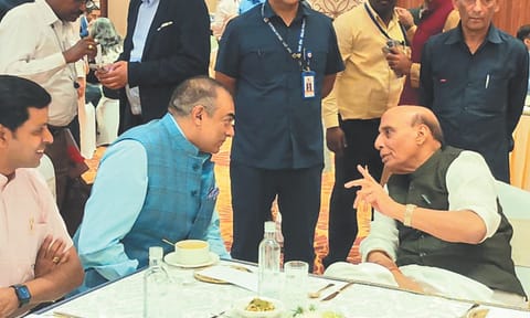 Director of Daily Thanthi Group S Balasubramanian Adityan with Rajnath Singh at the event in New Delhi
