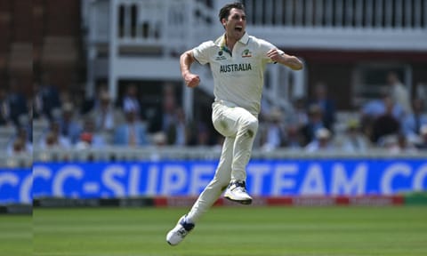 Pat Cummins celebrates after picking a wicket