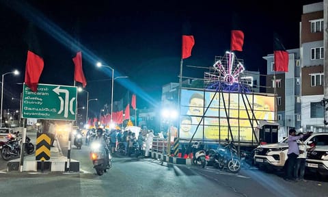 A political meeting in progress on the service road&nbsp;