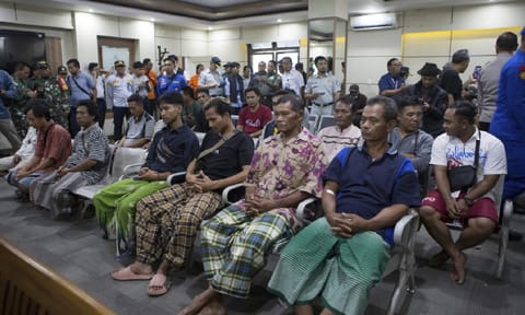 &nbsp;Survivors rescued after a ferry sank wait for a health examination in Gilimanuk on Bali island, Indonesia (Credit: AP Photo)