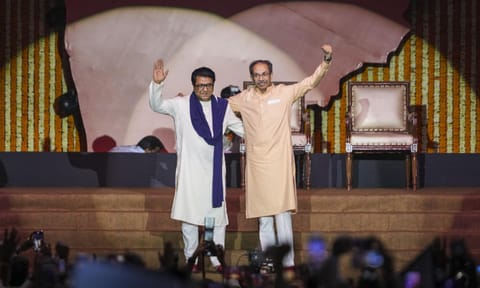 Maharashtra Navnirman Sena (MNS) chief Raj Thackeray, back, and Shiv Sena (UBT) chief Uddhav Thackeray during a joint victory rally, titled 'Awaj Marathicha', organised by the cousins, at Worli area, in Mumbai, Maharashtra, Saturday, July 5, 2025 (PTI)&nbsp;