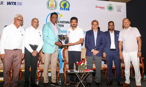 Deputy CM Udhyanidhi Stalin being presented with a Wimbledon 2024 annual book by TNTA President Vijay Amritraj during the event