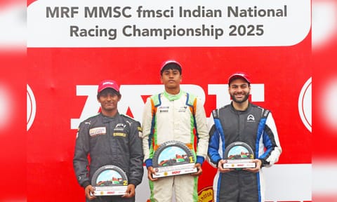 MRF F2000 Race-2 winner Ishaan Madesh (centre), flanked by second-placed Arjun Chheda (left) and third-placed Akhil Agarwal