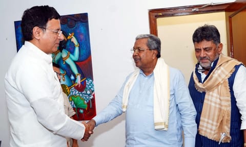 In this image posted by @siddaramaiah via X on July 24, 2025, Karnataka Chief Minister Siddaramaiah with Deputy CM DK Shivakumar during a meeting with AICC General Secretary Randeep Singh Surjewala, in New Delhi (PTI)