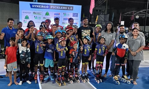 Vijay Shankar with the skating team at the venue
