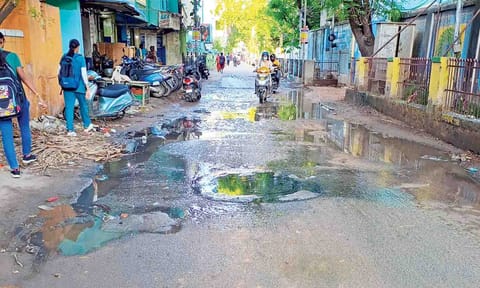 Overflowing sewage often splashes on the school kids when vehicles speed through the street&nbsp;