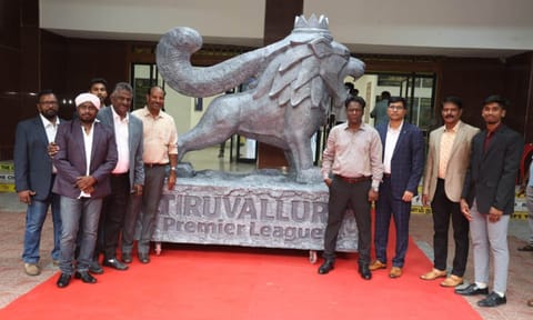 Olympians and other guests pose in front of the new mascot&nbsp;