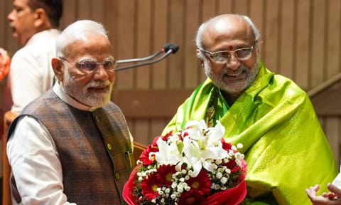 Prime Minister Narendra Modi felicitates Maharashtra Governor and NDA's vice presidential candidate C.P. Radhakrishnan during the NDA parliamentary party meeting (PTI)