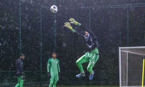 Gurpreet Singh Sandhu leaps for the ball during training&nbsp;