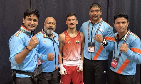 Pawan Bartwal and his coaches after the bout&nbsp;