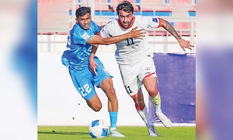 Ashique Kuruniyan fights for the ball with a Afghan player&nbsp;