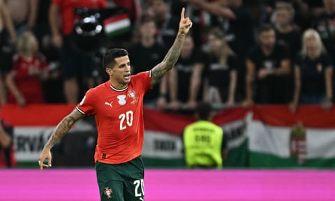 Joao Cancelo celebrates after scoring the winner