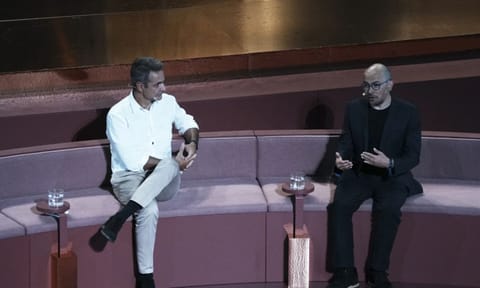 Demis Hassabis, CEO of Google's artificial intelligence research company DeepMind, right, and Greece's Prime Minister Kyriakos Mitsotakis discuss the future of Al, ethics and democracy during an event at the Odeon of Herodes Atticus (AP)