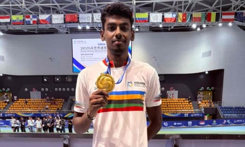 Anandkumar Velkumar poses with his medal&nbsp;