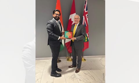 Indian Acting Consul General Kapidhwaja Pratap Singh, with Canadian Minister of Economic Development, Victor Fedeli (IANS)&nbsp;