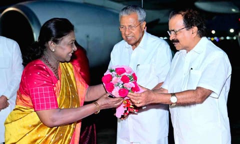 President Droupadi Murmu being received by Union Minister of State George Kurian and Kerala Chief Minister Pinarayi Vijayan upon her arrival in Thiruvananthapuram (PTI)&nbsp;