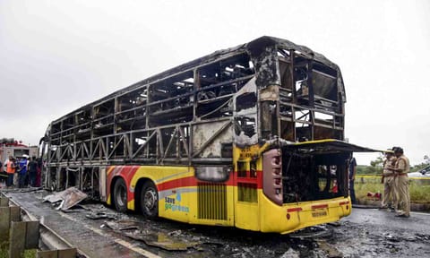 A Hyderabad-bound private bus after it caught fire following a collision with a two-wheeler, near Chinnatekur in Kurnool district, Andhra Pradesh, Friday, Oct. 24, 2025 (PTI)&nbsp;