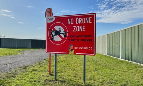 A no drone sign just outside the perimeter of Brussels International Airport in Zaventem, Belgium, after reported overnight drone activity over the airport. (Photo: AP)