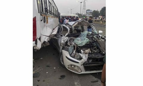 Pune: People stand near mangled remains of a car after an accident on the Mumbai-Bengaluru Highway, in Pune, Maharashtra, Thursday, Nov. 13, 2025 (PTI)&nbsp;