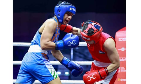 Preeti advances for a punch against Uktamova Nigina during the match&nbsp;