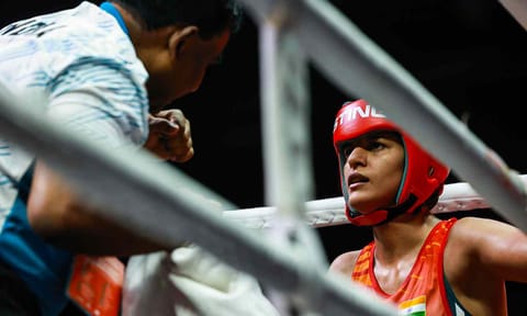 Jaismine Lamboria’s coach fires instructions as his boxer readies for next round&nbsp;
