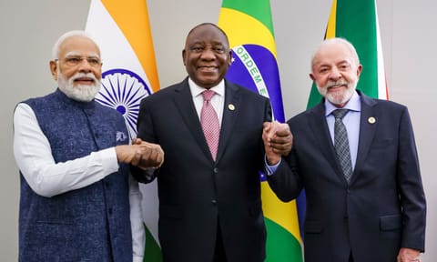 In this image received on Nov. 23, 2025, Prime Minister Narendra Modi with South African President Cyril Ramaphosa, center, and Brazilian President Luiz Inacio Lula da Silva, right, during IBSA Leaders' meeting, on the sidelines of the G20 Summit, in Johannesburg, South Africa. (PMO via PTI )
