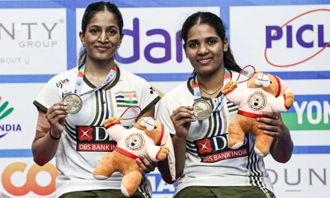 Gayatri Gopichand and Treesa Jolly poses with the doubles gold medal (PTI)&nbsp;