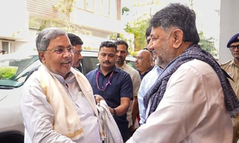 Karnataka Chief Minister Siddaramaiah with Deputy CM DK Shivakumar during a breakfast meeting at his residence, in Bengaluru, Karnataka. (PTI)&nbsp;