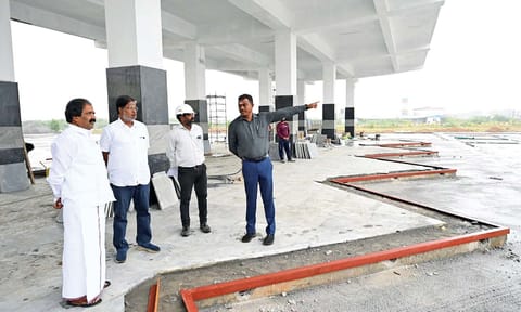 Tiruchy Mayor Mu Anbalagan inspecting the omnibus terminus works at Panjapur on Wednesday&nbsp;