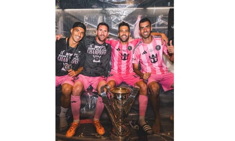 Luis Suarez, Lionel Messi, Jordi Alba and Sergio Busquets with the trophy&nbsp;