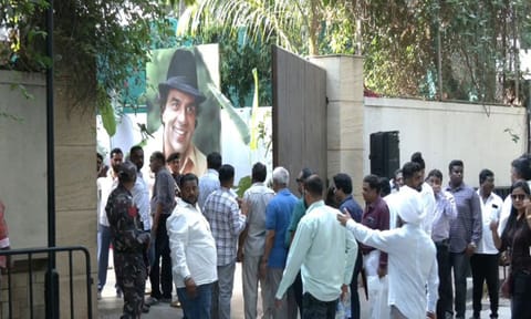 Fans gather outside Dharmendra's residence (ANI)