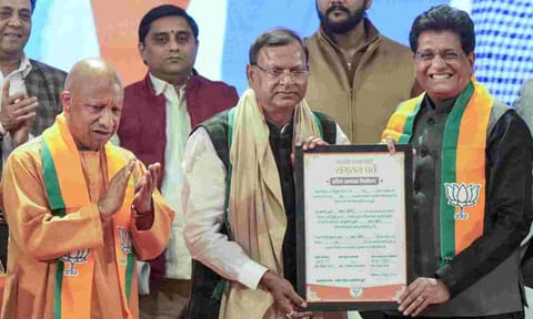 Union Minister Piyush Goyal, Uttar Pradesh Chief Minister Yogi Adityanath, state Deputy Chief Minister Brajesh Pathak with newly elected BJP state president Pankaj Chaudhary during the 'Sangathan Parv' event, in Lucknow, Sunday, Dec. 14, 2025 (PTI)&nbsp;