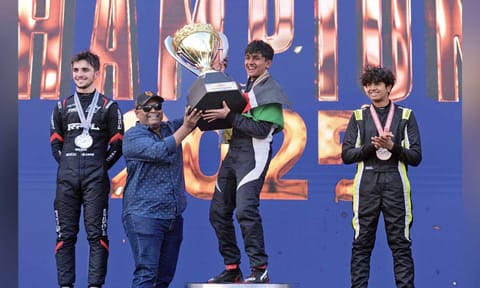 Shane Chandaria being awarded the championship trophy