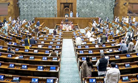 &nbsp;BJP MP Dilip Saikia presides over the Lok Sabha amid a protest by opposition leaders during the Winter session of Parliament