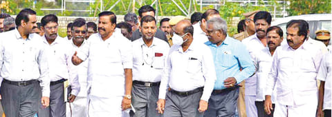 Minister KN Nehru inspecting the site for the integrated bus stand at Panchapur in Tiruchy, on Saturday