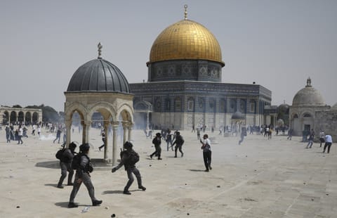 Israeli police said hundreds of Palestinians hurled firecrackers and stones at their forces and toward the nearby Jewish prayer area