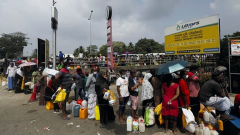 People lined up to buy kerosene oil