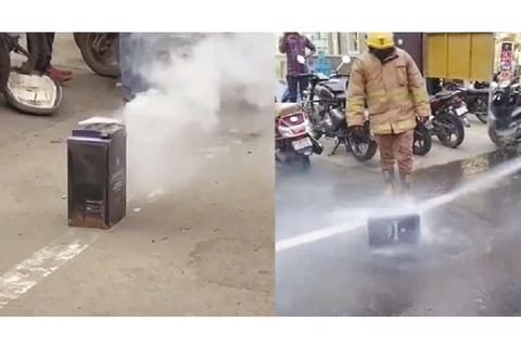 Fire and Rescue Services personnel dousing the fire