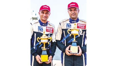 Karna Kadur (right) and his co-driver Nikhil Pai with their trophies