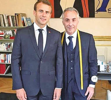 Macron counts on an everyman’s tailor for spartan suits