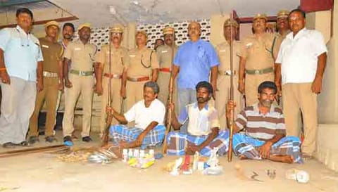 The accused with the country made guns.
