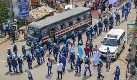 Rapid Action Force personnel keep vigil after clashes broke out between two communities at Jahangirpuri