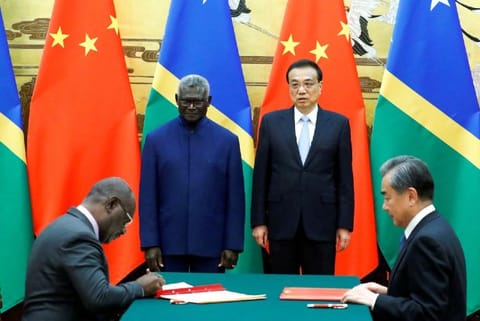 Solomon Islands PM Manasseh Sogavare and Foreign Minister Wang Yi