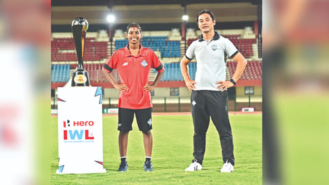 Sethu FC captain R Sandhiya and head coach Crispin Chettri with the IWL trophy