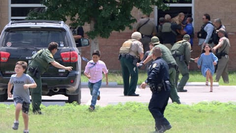 Children run for safety