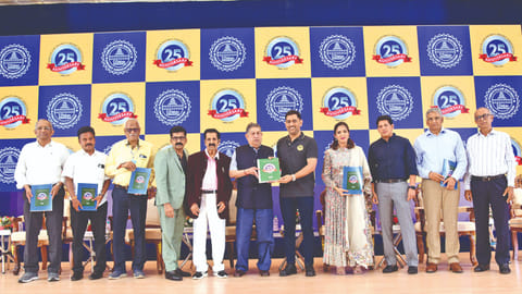 MS Dhoni and N Srinivasan unveil the TDCA silver jubilee souvenir