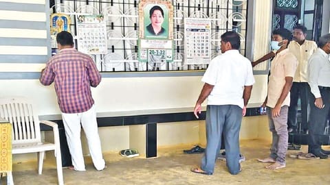 Officials measuring the house of ex-AIADMK minister P Thangamani in Namakkal on Wednesday